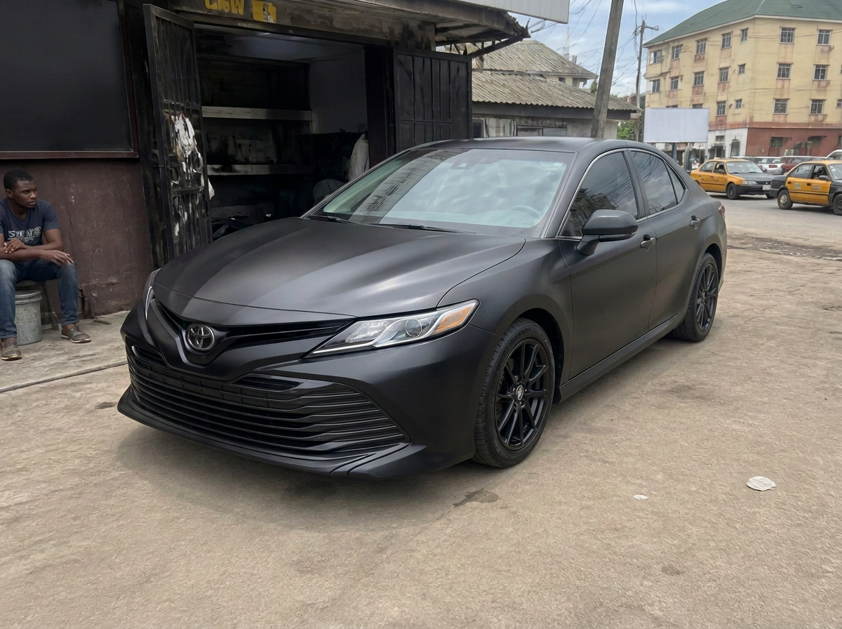 Wrapped Toyota Camry outside the workshop